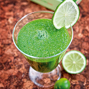 Glass of green apple, celery juice.