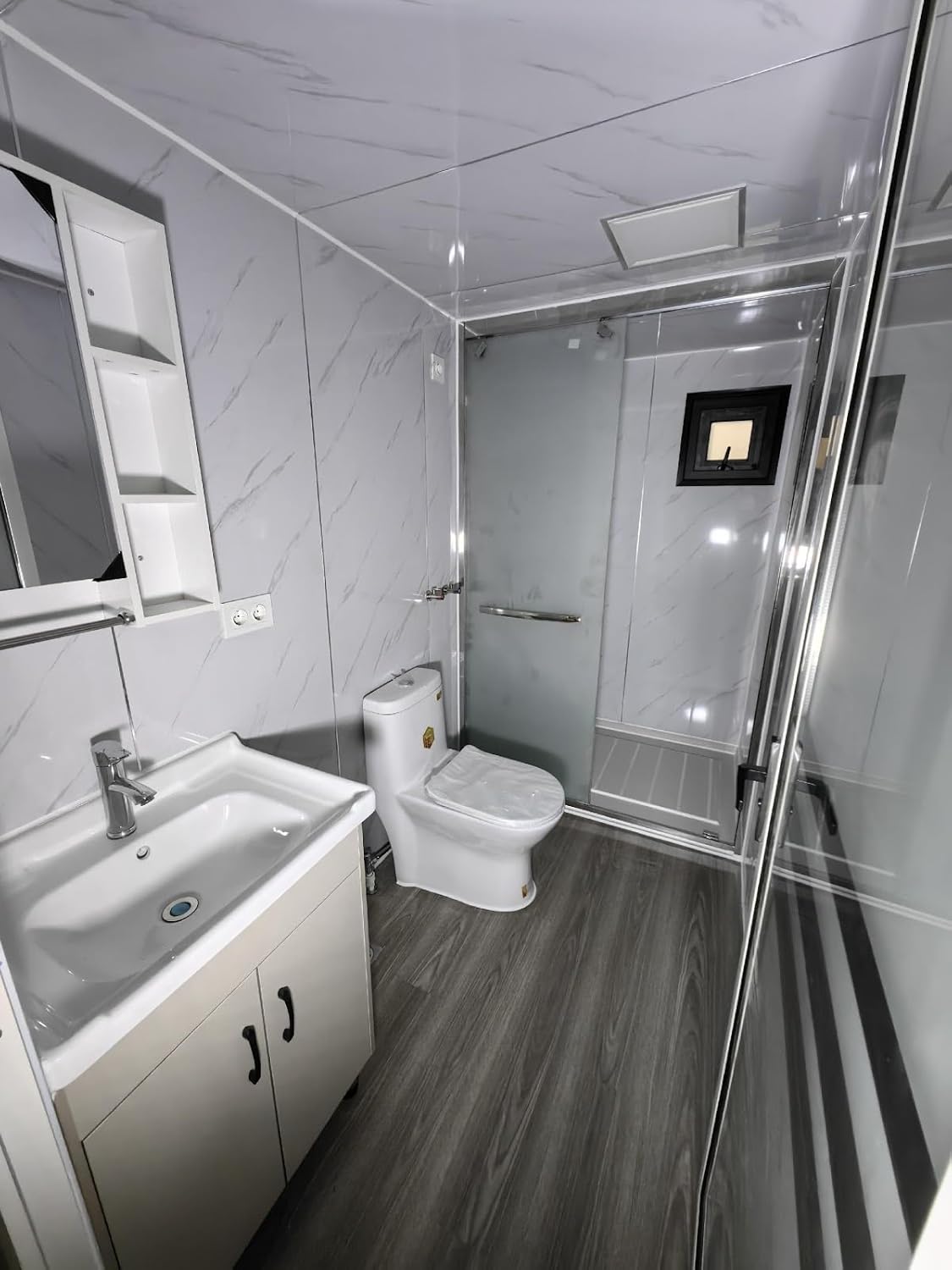 20FT prefabricated tiny house with lockable door and window, ideal as a hotel, booth, or office. includes an outdoor storage shed with restroom and cabinet. Perfect for a mobile tiny home or office. - Image 2