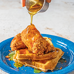 Chicken ’N’ Waffle Bussdowns on a blue plate