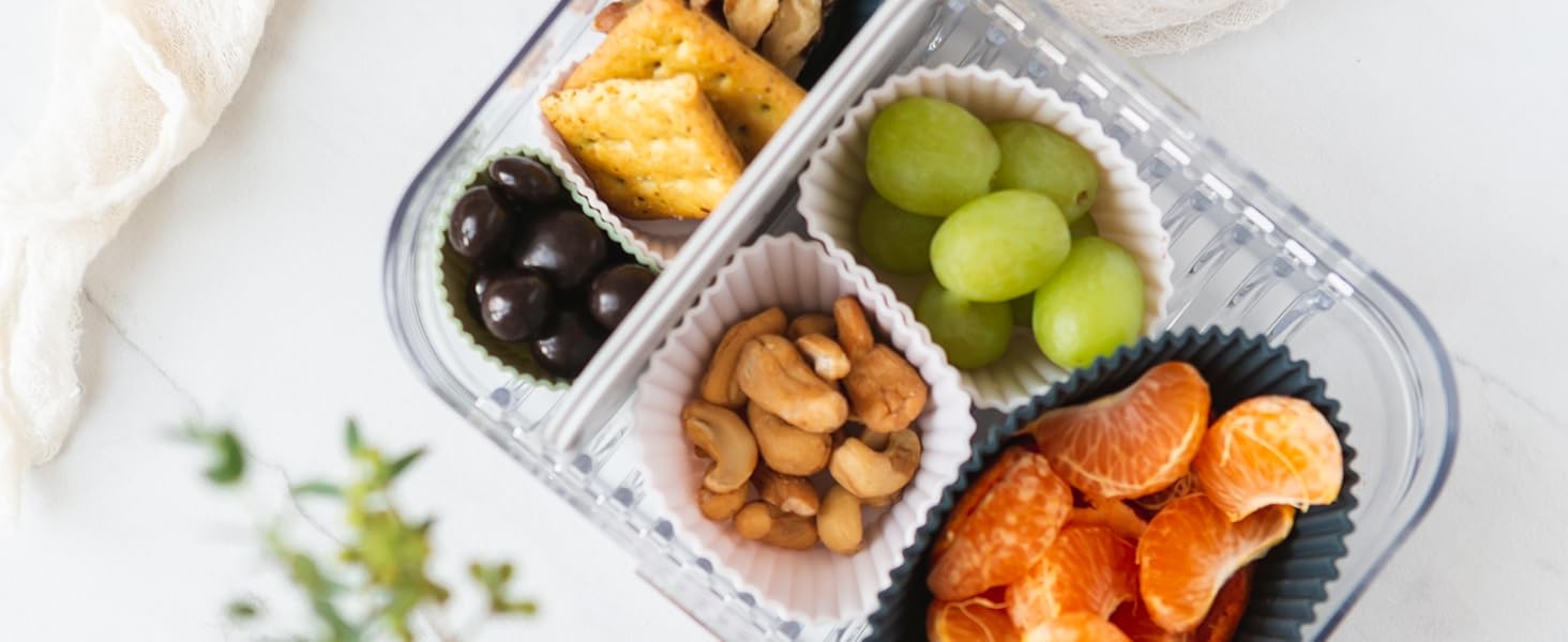 Snacks and fruit in a bento-style lunch box