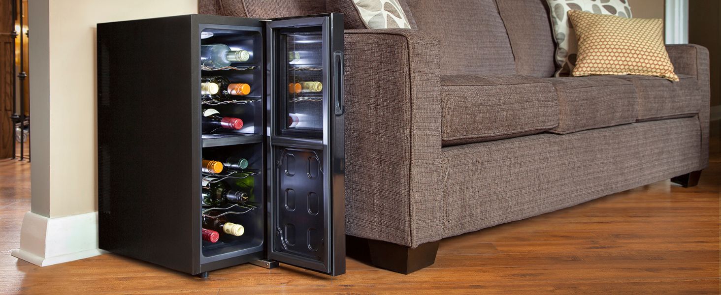 12-bottle dual zone wine cooler filled with red and white wine bottles in an elegant living room